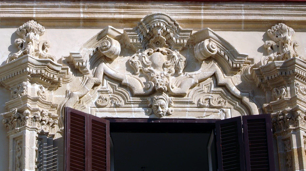 A limestone and sandstone façade entrance being cleaned with DESCA 100 A limestone and sandstone façade entrance being cleaned with DESCA 100